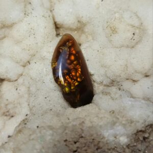 3.49ct 16x9mm Tear Drop Cabochon with Vibrant Yellow, Orange, and Red Flash