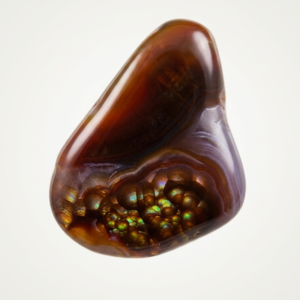Fire agate cabochon with natural chalcedony banding and botryoidal fire cluster, 11.11 carats